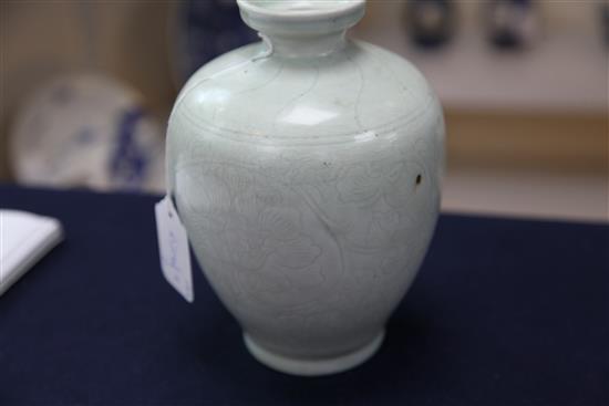 A Chinese celadon glazed ovoid vase, Qing dynasty, height 20cm
